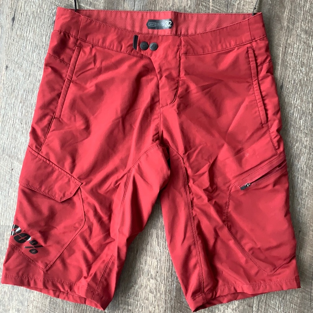 100% red and black mountain bike shorts